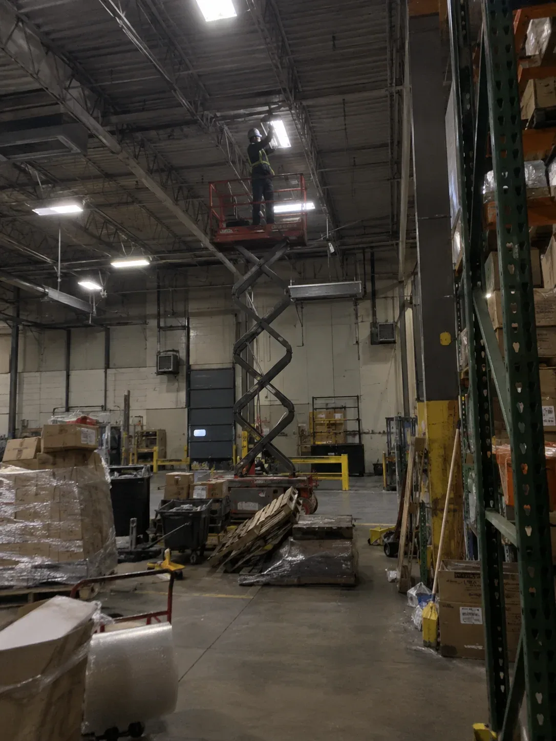 Industrial electrical work inside a warehouse