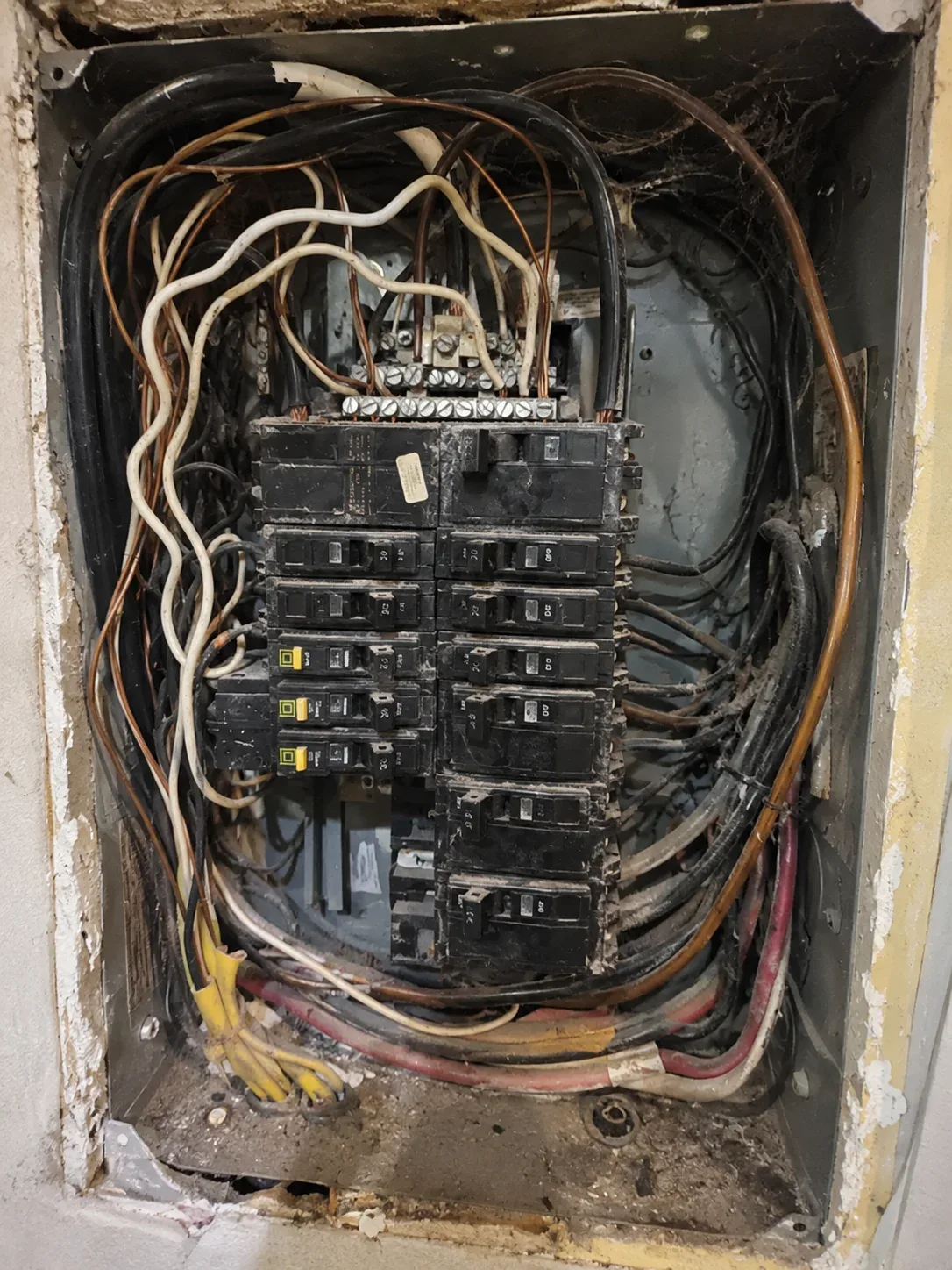 Older residential electrical panel before upgrade