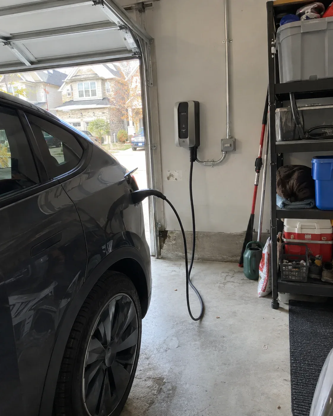Level 2 EV charger installed in a residential garage in Milton